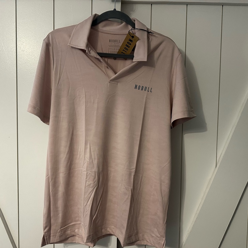 Nobull Polo in blush. Size Large